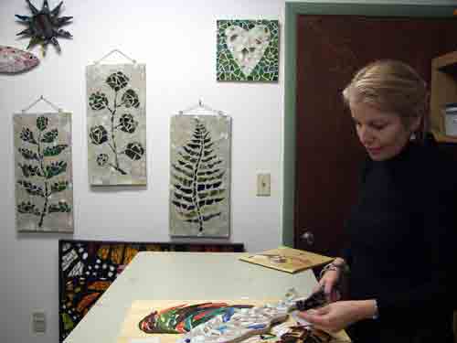 Mosaic artist Kim Hogan in the studio she shares with videographer Bruce Ward @ The Banana Factory.